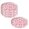 Four round acrylic coasters with leopard palms pattern on a white background